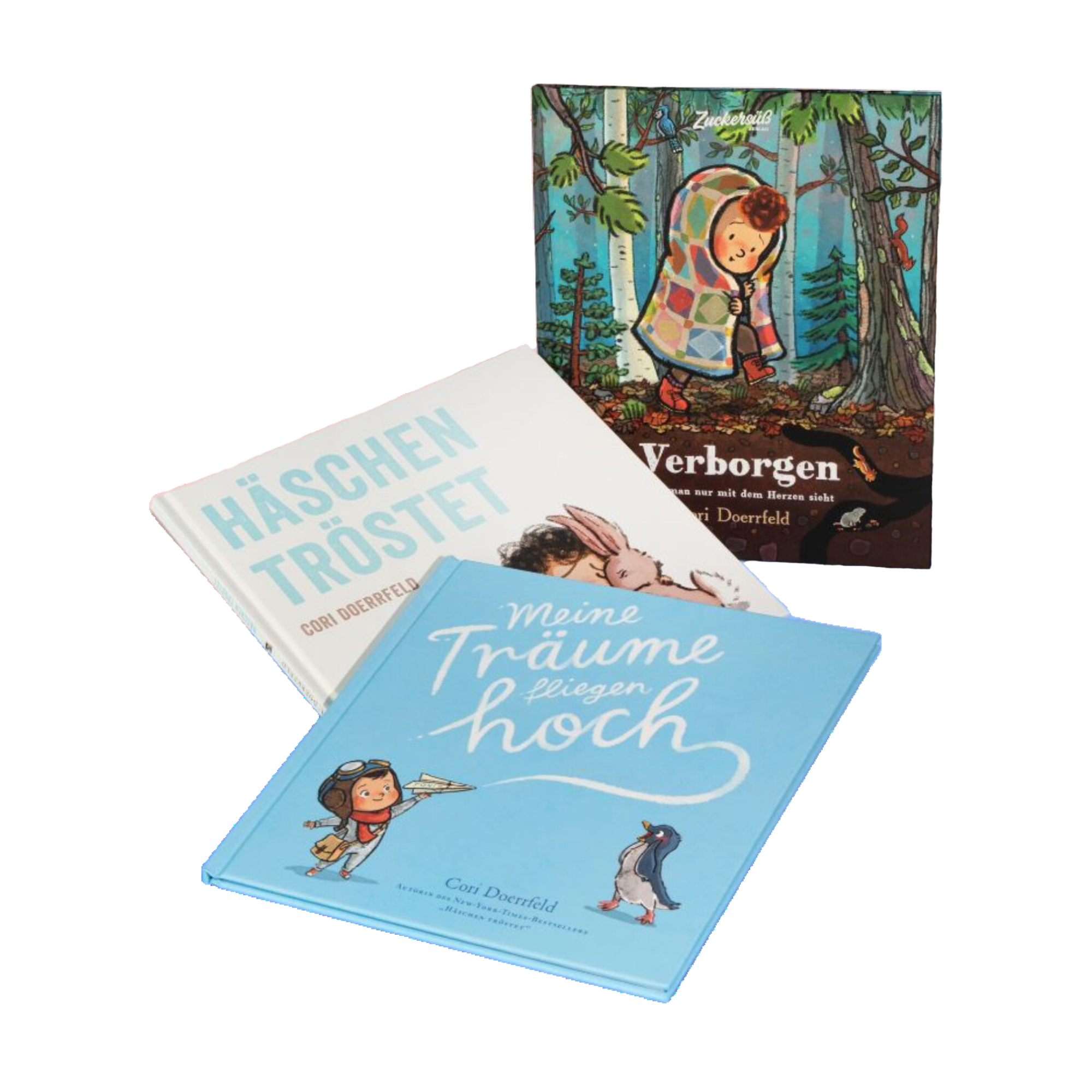 Drei illustrierte Kinderbücher von Cori Doerrfeld aus dem Zuckersüß Verlag liegen nebeneinander: "Häschen tröstet" mit einem Kind und einem Hasen auf dem Cover, "Meine Träume fliegen hoch" mit einem Kind und einem Pinguin, sowie "Verborgen", das ein Kind mit einer bunten Decke im Wald zeigt. Das Bücherpaket trägt den Titel „Best of Cori Doerrfeld“.
