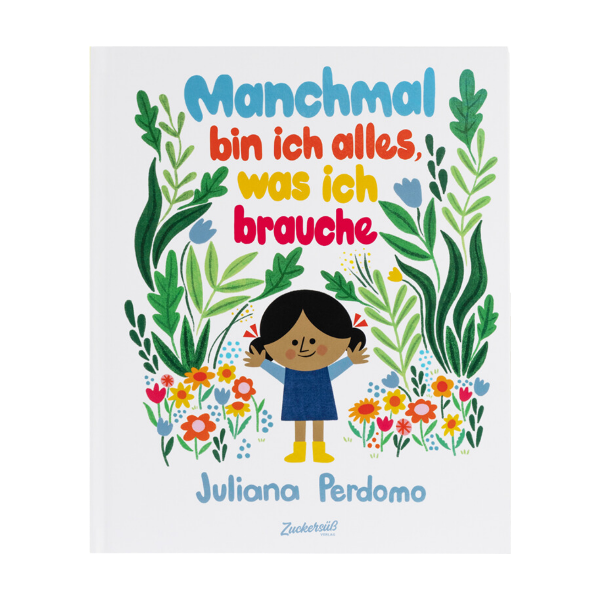 Das Cover des Kinderbuchs „Manchmal bin ich alles, was ich brauche“ von Juliana Perdomo zeigt ein lächelndes Kind mit dunklen Haaren in einem blauen Kleid, das zwischen bunten Blumen und grünen Pflanzen steht. Darüber ist der farbenfrohe Titel in großen Buchstaben zu lesen.