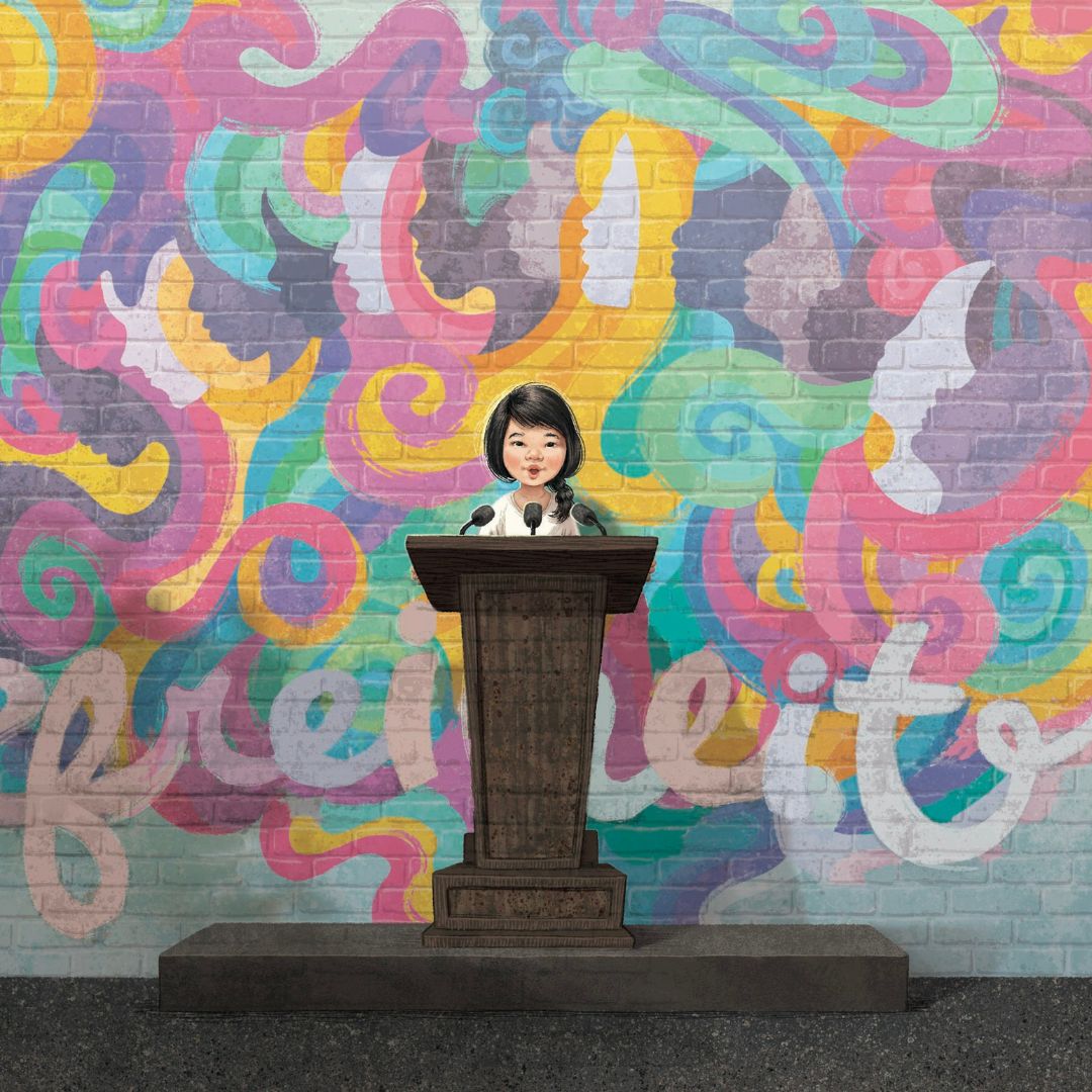Ein Kind steht an einem Podium mit Mikrofonen, ihre Stimme ist selbstbewusst, hinter ihr ein buntes Wandgemälde mit dem Schriftzug "freiheit" - ganz im Sinne von "Eine Stimme wie deine" von Frank Murphy und April Groman.