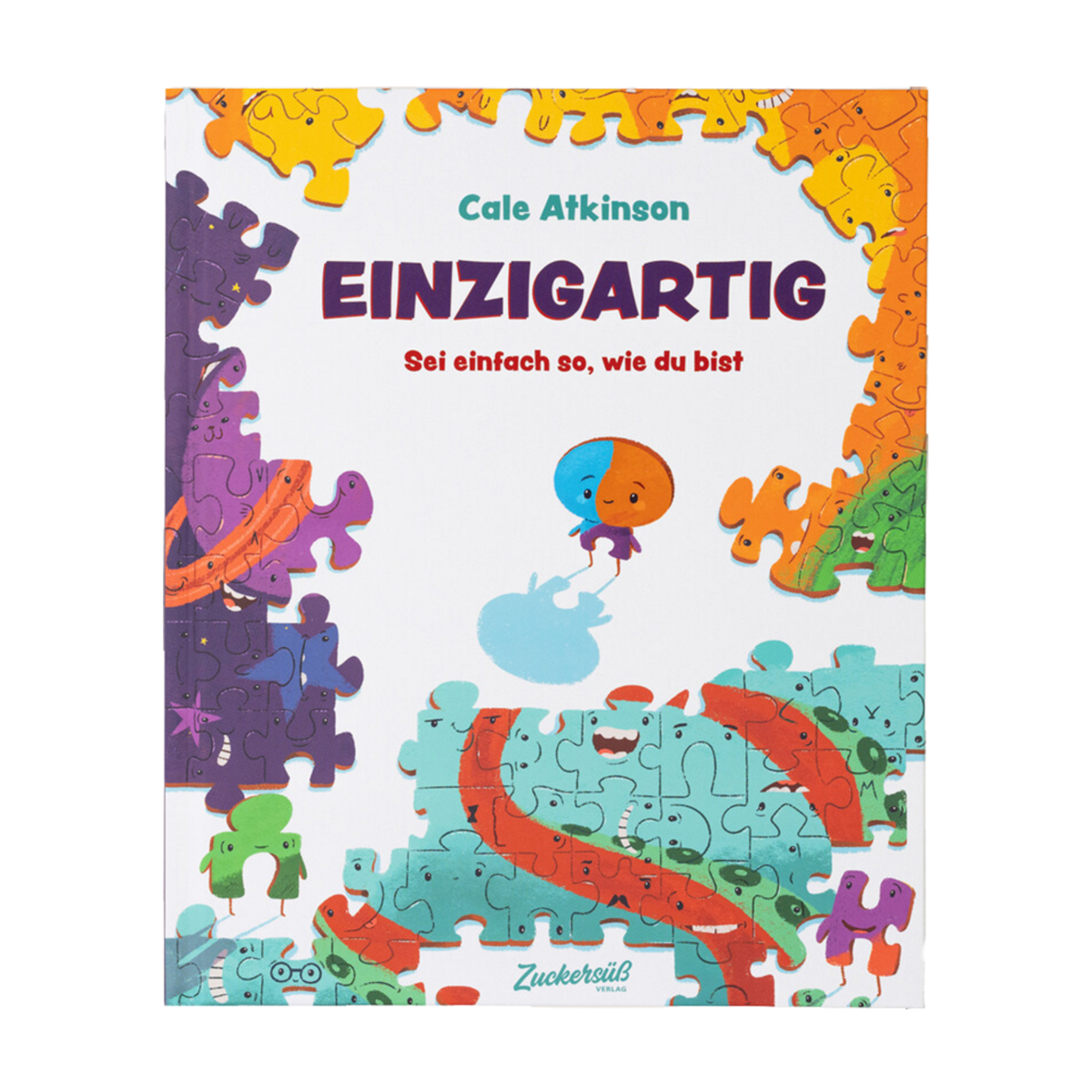Das Cover von Einzigartig von Cale Atkinson zeigt eine Cartoon-Puzzleszene mit einer blauen Figur und bunten Teilen. Der Untertitel "Sei einfach so, wie du bist" inspiriert zum Selbstvertrauen und feiert die Einzigartigkeit.