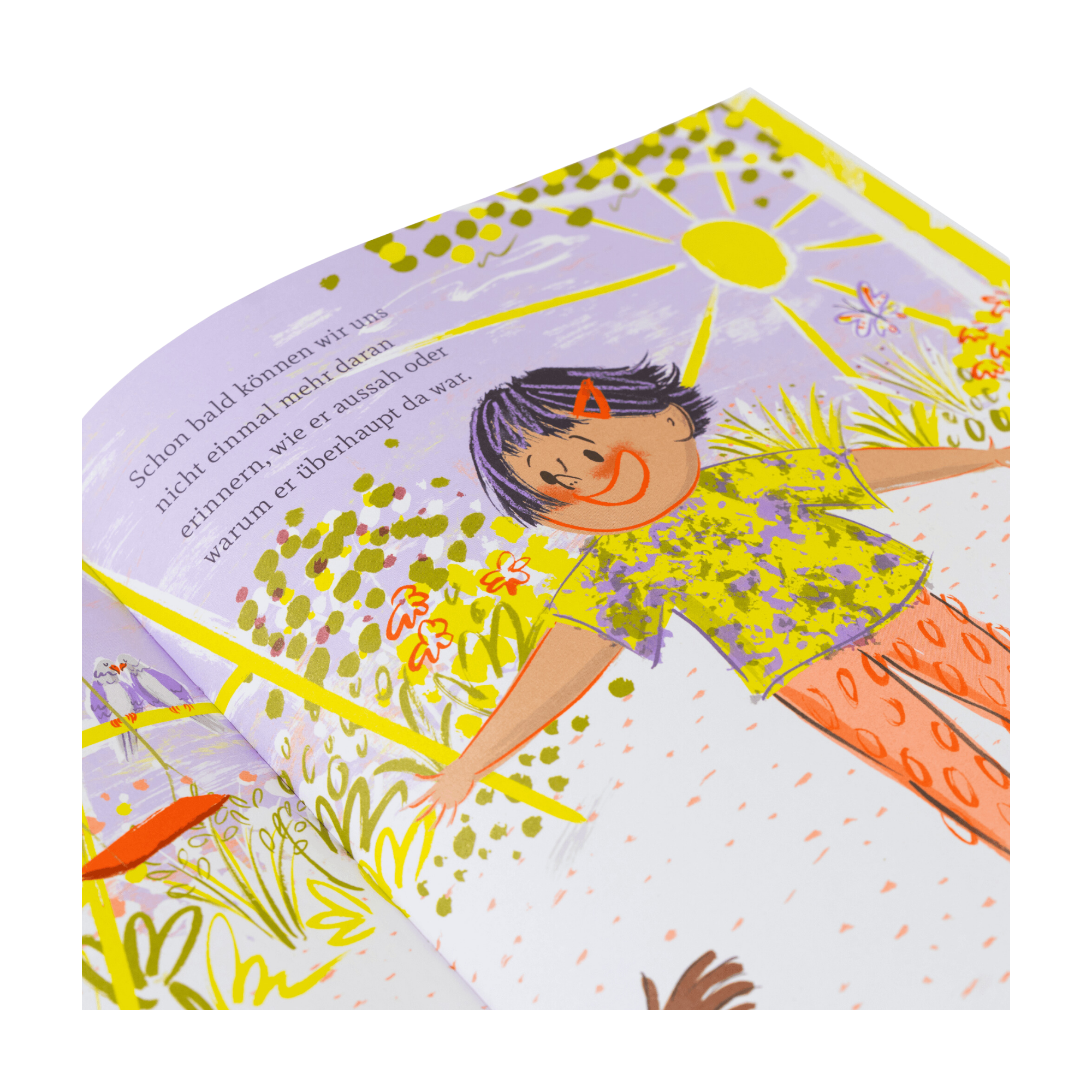 Eine farbenfrohe Seite aus dem "Freundschafts-Starter Pack" des Zuckersüß Verlags zeigt ein lächelndes Kind mit ausgebreiteten Armen im Freien, unter der Sonne und zwischen Bäumen und Blumen. Über der Illustration steht ein deutscher Text über Empathie.