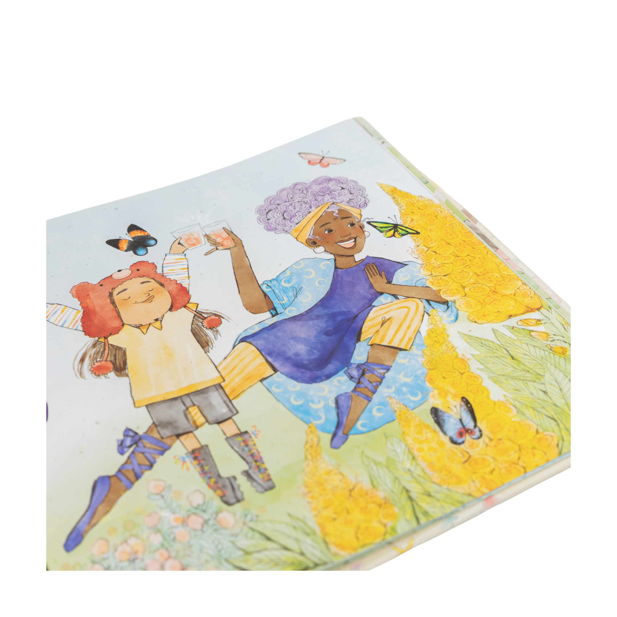 Eine illustrierte Kinderbuchseite aus "Eine gute Tat" von Christian Trimmer zeigt zwei Kinder - eines mit rotem Hut, das andere mit lockigem Haar, blauem Kleid und gestreiften Leggings -, die fröhlich zwischen gelben Blumen und Schmetterlingen spielen und Mitgefühl ausstrahlen.