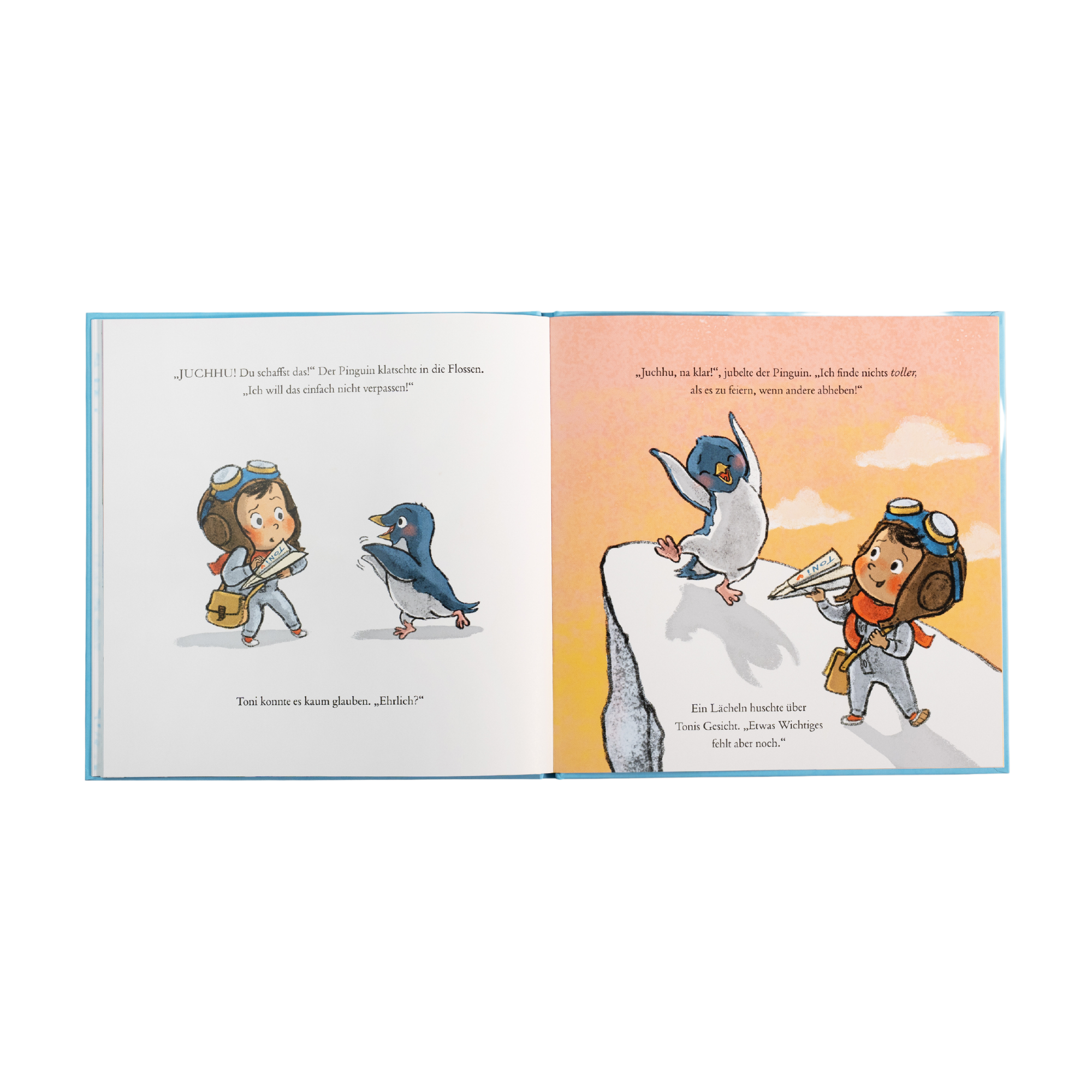 Eine Doppelseite aus dem Vorlesebuch "Meine Träume fliegen hoch" von Cori Doerrfeld zeigt ein Kind mit Fliegerbrille und einen freudigen Pinguin. Links feuert der Pinguin das Kind an, rechts jubelt er am Klippenrand.